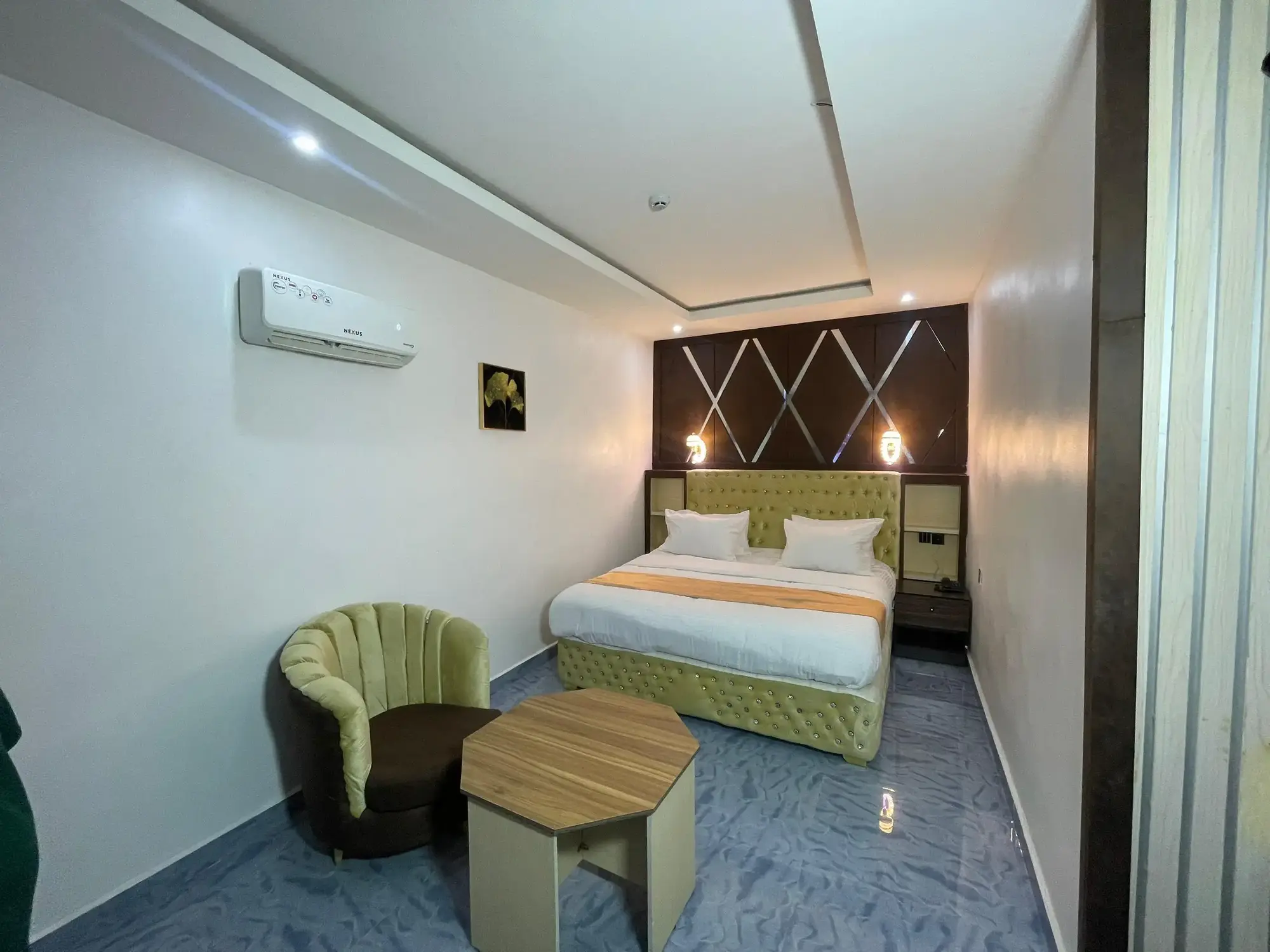 Executive Suite bedroom and living space at Linksview Hotel & Suites